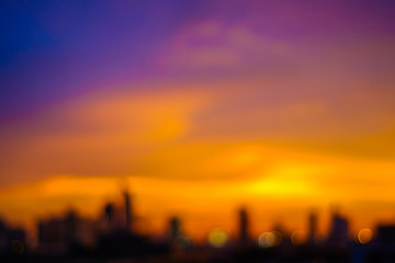 Colorful blurred sky sunset silhouette city building