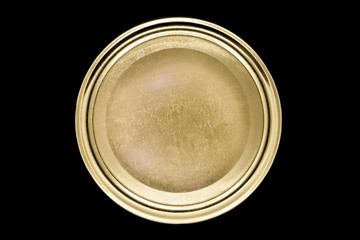 Golden jar lid isolated on black background