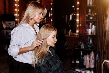 Beautiful woman in hair salon