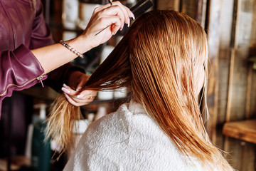 Fototapeta premium Beautiful woman in hair salon