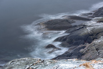 Rocks falling into the sea. Hamnoy, Lofoten islands, Norway