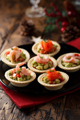 Shrimp and salmon appetizers with avocado cream