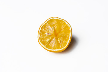 One slice of  yellow lemon citrus fruit isolated on white background, copy space