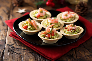 Shrimp and salmon appetizers with avocado cream