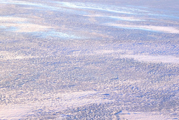 A Field covered with a snow in winter season.