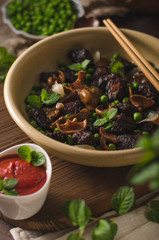 Homemade thai meat with forest mushrooms