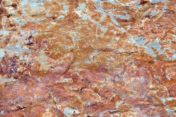 orange and blue rusty surface