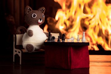 cat in front of fireplace © Людмила Петрова