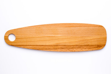 Wooden long kitchen board on a white background top view