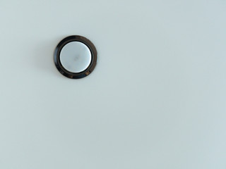 simple round lamp on the ceiling. White background