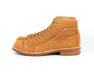 Men’s brown  boot with nubuck leather for man collection isolated on a white background.