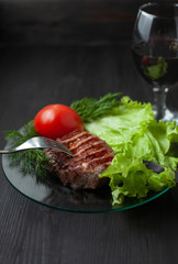 Delicious slice of beef steak on dish