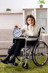 Woman in wheelchair at home 