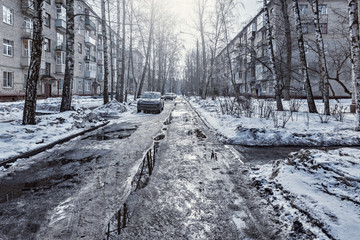 View of the small town street at spring day time.