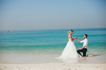 Fototapeta na wymiar brides near the sea