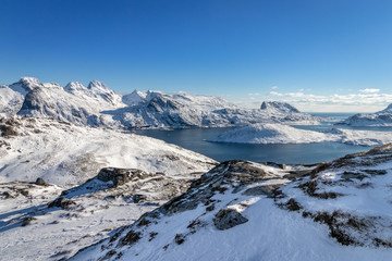 Fototapeta na wymiar Panoramic view of a part of the Lofoten Islands in Norway on a winter hike to Mount Ryten