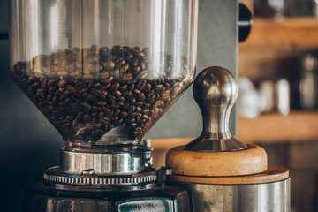 Coffee beans in a coffee grinder For coffee makers for customers