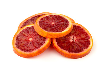 Bloody orange on a white background. Red orange cut into slices on a white background.