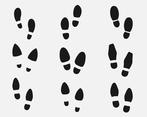 Set of footprints shoes silhouette. Vector 