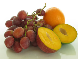 Mango, red grapes, orange, a combination of very different, but excellent flavors.