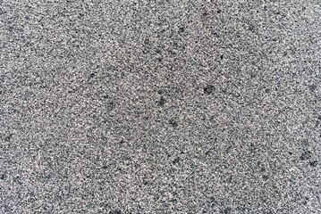 Gray granite unpolished slab as the basis of the original background.