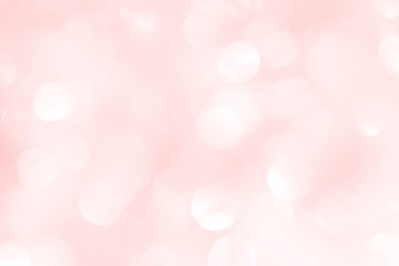 A shiny pink New Year's background for a holiday card. A wallpaper with a blurry pattern.