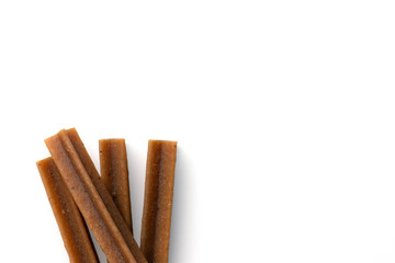 Dog snack stick dental chew isolated on white background. Dental sticks top view. - Image