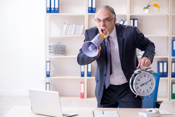 White bearded old businessman employee unhappy with excessive wo