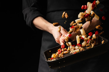 Professional chef prepares seafood with hot chili peppers. octopus kalmar mussels. Sea food. Asian and Oriental cuisine, Mexican spicy. Culinary background. Freezing food © Anton