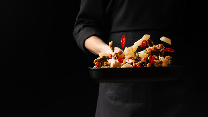 Professional chef prepares seafood with hot chili peppers. octopus kalmar mussels. Sea food. Asian and Oriental cuisine, Mexican spicy. Culinary background. Freezing food © Anton