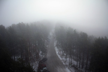 Winter forest covered by clouds view, Tampere, Finland