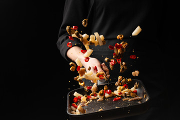 Professional chef prepares seafood with hot chili peppers. octopus kalmar mussels. Sea food. Asian and Oriental cuisine, Mexican spicy. Culinary background. Freezing food close up © Anton