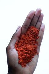 Isolated female african hand holding powder