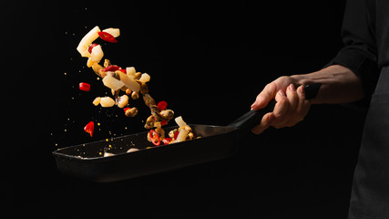 Professional chef prepares seafood with hot chili peppers. octopus kalmar mussels. Sea food. Asian and Oriental cuisine, Mexican spicy. Culinary background. Freezing food close up © Anton