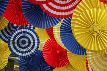 Paper fan colorful background art decoration in summer season at department store of Thailand 