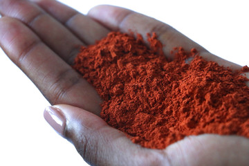 Isolated female african hand holding powder