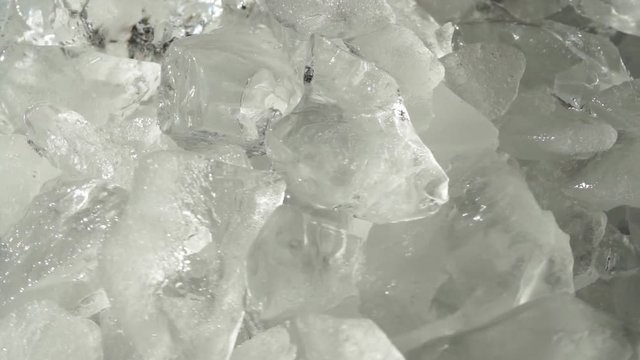 Crushed ice for drinks and cocktails. Background with crushed ice cubes