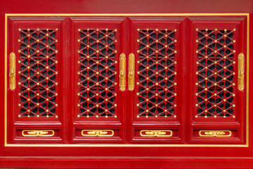oriental pattern details on wooden door or windows in the Forbidden City of Imperial Royal Palace