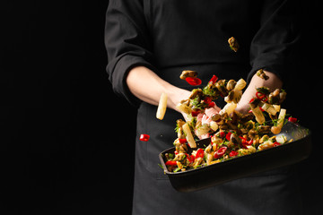 Professional chef prepares seafood with spicy chili peppers and greens. octopus kalmar mussels. Sea food. Asian and Oriental cuisine, Mexican spicy. Culinary background. Freezing food © Anton