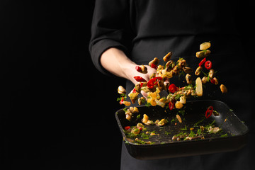 Professional chef prepares seafood with spicy chili peppers and greens. octopus kalmar mussels. Sea food. Asian and Oriental cuisine, Mexican spicy. Culinary background. Freezing food © Anton