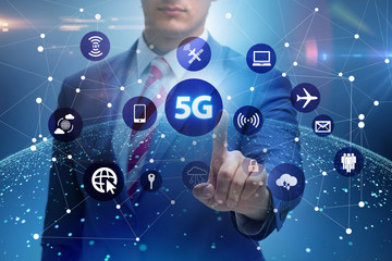 5g internet concept with businessman pressing buttons