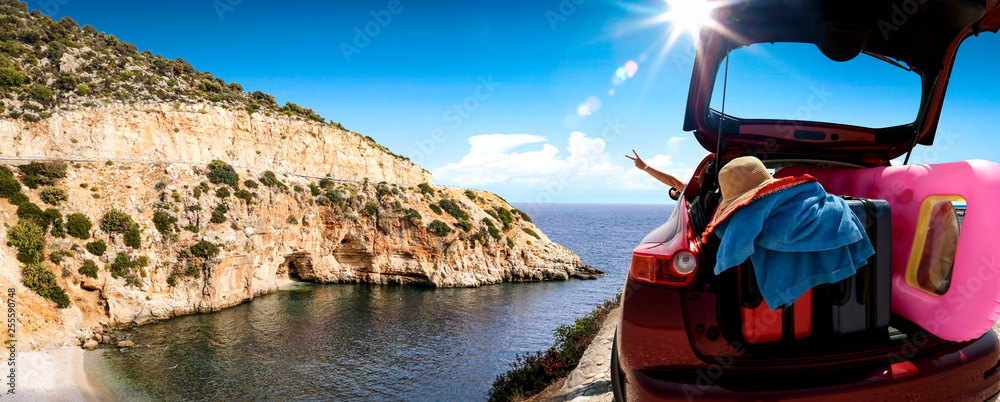 Wall mural summer car on road and sea landscape