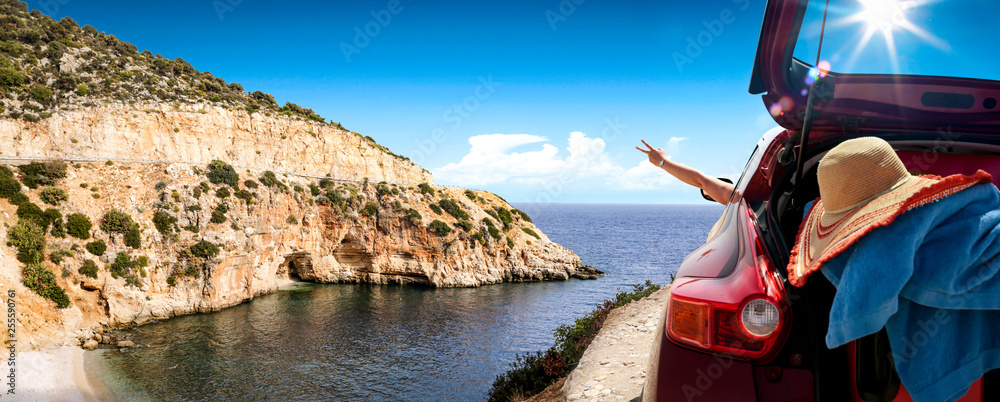 Wall mural summer car on road and sea landscape