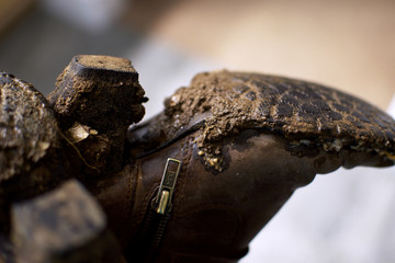 Muddy female boots