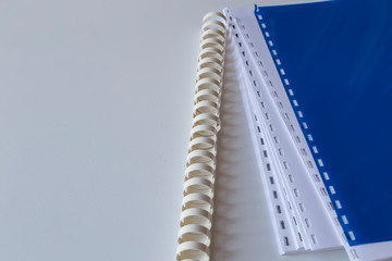 the spiral notebook on the white background.