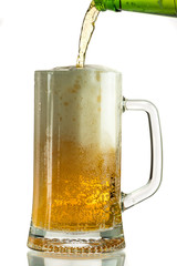 Pouring light beer in a beer mug, it turns out foam and spray