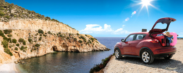 Summer car on road and sea landscape 