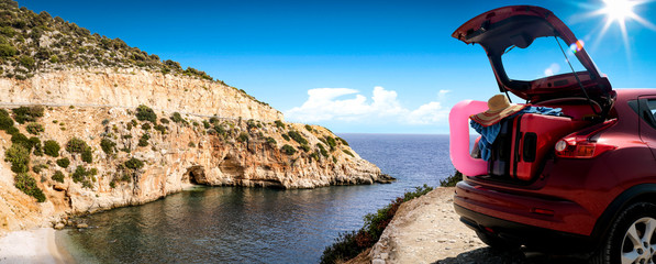 Summer car on road and sea landscape 