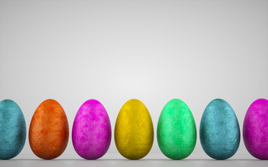 Chocolate easter eggs wrapped in colorful aluminum foil on white background. Delicious chocolate...