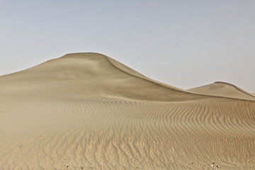 Shifting sand dunes-Takla Makan Desert. Hotan prefecture-Xinjiang Uyghur region-China-0043 - obrazy, fototapety, plakaty